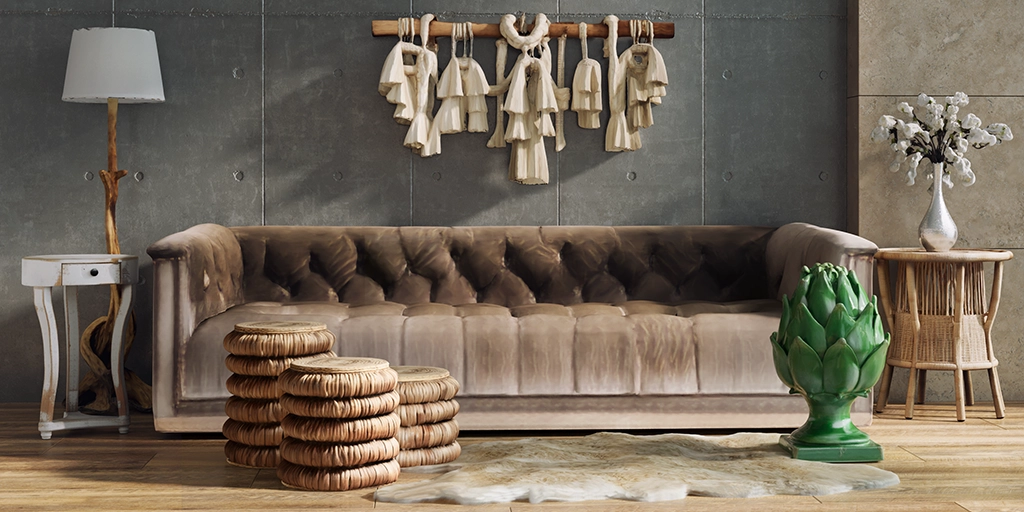 Input: Tufted sofa with woven stools and a green decorative object